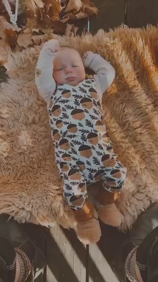 Beautiful baby on natural white sheepskin